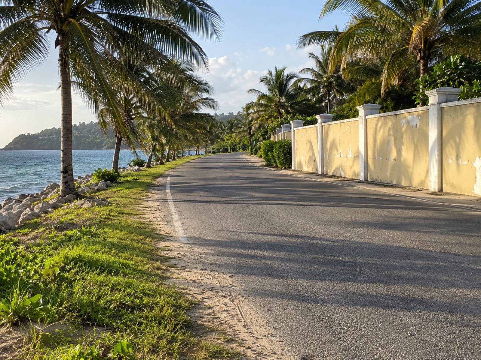 A resort-lined coastal road running along the water in Montego Bay