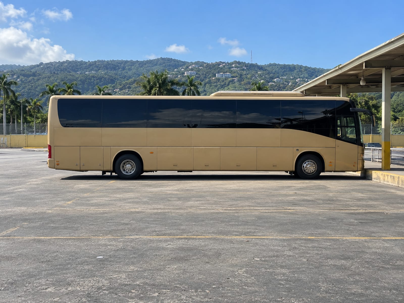 A long-distance coach parked at a terminal ready for departure