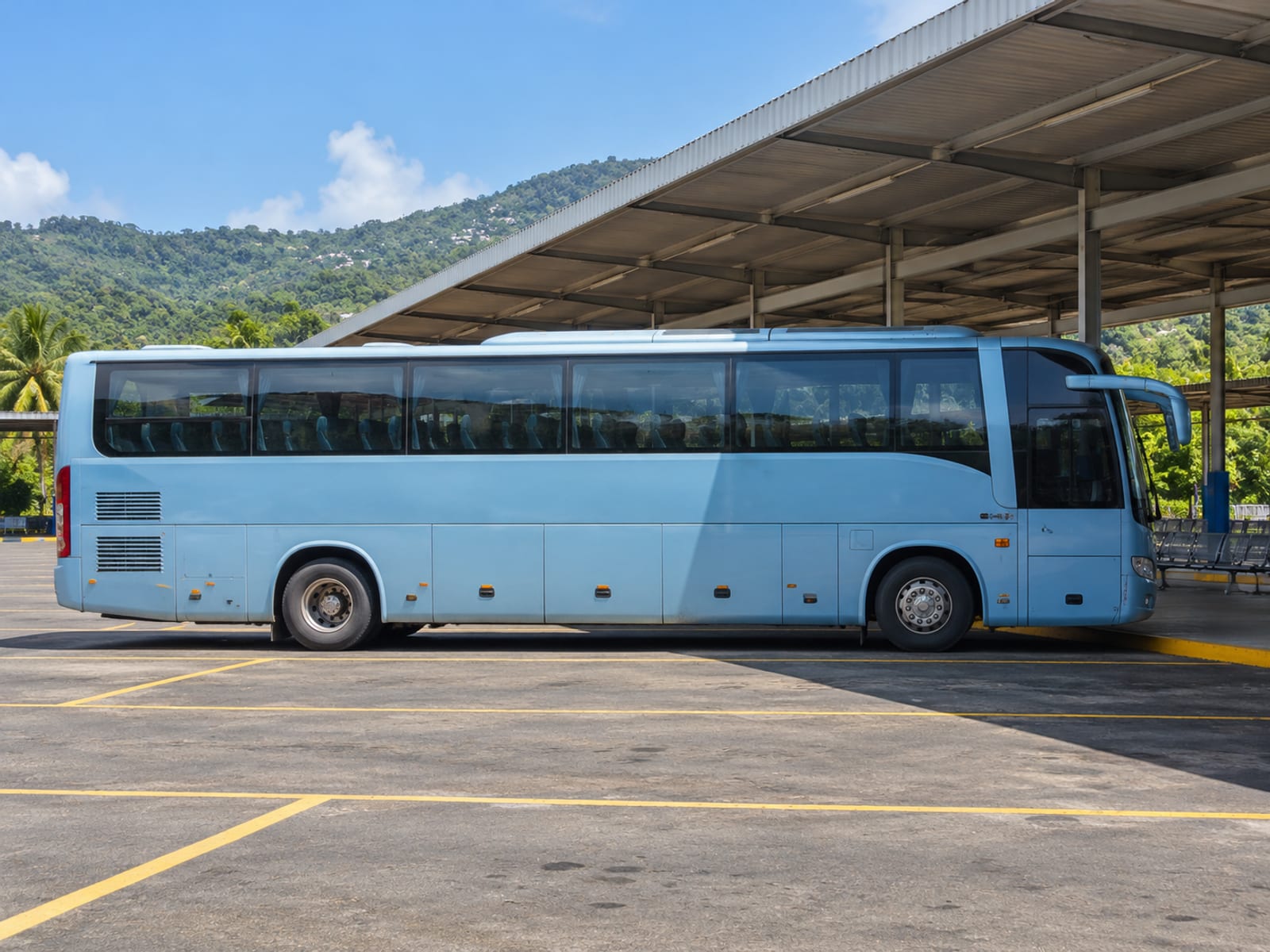 A long-distance coach waiting at a terminal bay